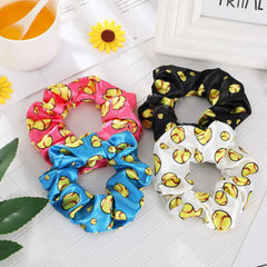 WILLBOND ball-themed satin hair scrunchie yellow keeps hair neat on busy days.