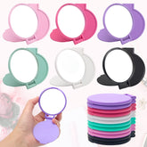 Windspeed mini folding round pink mirror for quick touch-ups on the go.