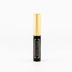 WINKCLIQUE eyelash adhesive in a black bottle for secure DIY extensions.