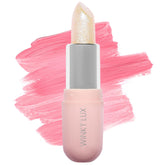 Bálsamo Unicorn Glimmer de Winky Lux en envase cristalino con destellos, ideal para un look sutil.