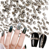 WOKOTO silver pyramid nail studs close-up showing 1-2mm size for edgy accents