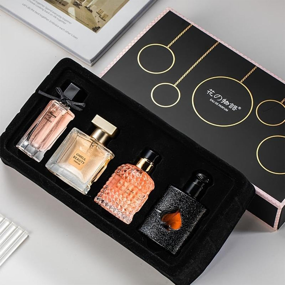Women's perfume set gift box with four fragrances, ideal for gifting.