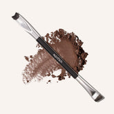 Woosh Corner Brush Eye Stamper with a V-shaped end for precise shadow placement.