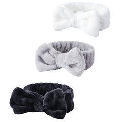 WSYUB Spa Headband with white bow keeps hair away during skincare.