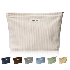 Wudygirl travel makeup bag in beige corduroy exterior offering stylish travel organization