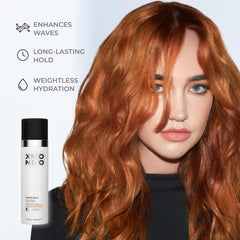 XMONDO Hair Wavetech hands applying cream for even coverage on damp hair.