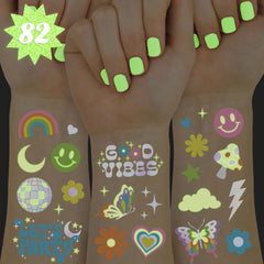 xo, Fetti glow tattoo sheets with 82 iridescent designs for festive party decor.