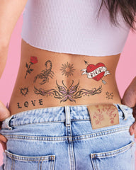 xo Fetti crosses tattoo sheet for chic occasion accents and safe wear
