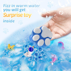 Yekery Space Planets bath bombs revealing an astronaut toy during bath time.
