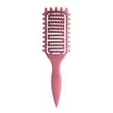 Yingbtr curl-defining brush with ergonomic handle for precise styling.