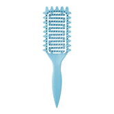 Yingbtr curl-defining brush with ergonomic handle for easy detangling and shaping.