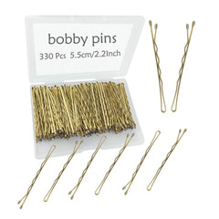Pinzas para el pelo YINGFENG en primer plano, agarre firme y acabado dorado.