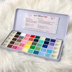 YJMyujimi gel palette case open with 40 colors for quick nail art selection.
