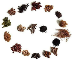 Yogi’s Gift Herbal Hair Oil Mix packaging showcases Ayurvedic 18-herb blend.