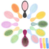 YOJOR mini wet hair brush travel-friendly detangler for on-the-go styling.