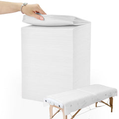 Ypfyed disposable sheets unrolled on a massage table for client comfort