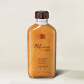 Yves Rocher Monoi Tahiti oil bottle pour, smooth application and quick absorption.