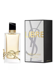YSL Libre cap and logo highlight premium branding for refined evening looks.