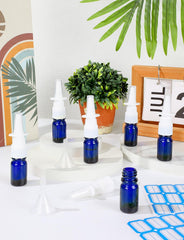 ZHWKMYP blue nasal spray bottle closeup showing smooth glass and reliable mist.