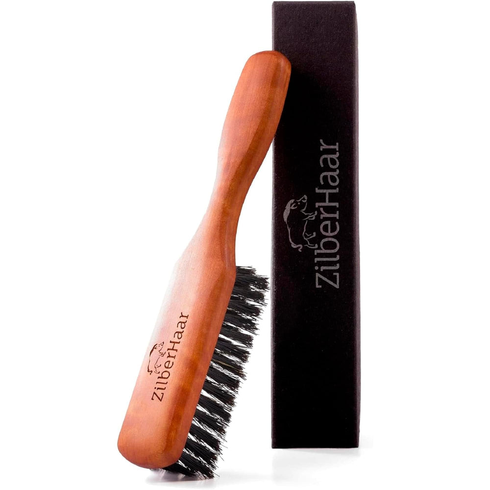 ZilberHaar beard brush with stiff boar bristles for thorough cleansing.