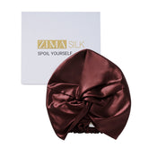ZIMASILK silk bonnet worn during sleep reduces frizz and preserves moisture.