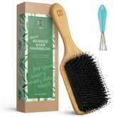 Zollo natural boar-bristle brush paddle for gentle detangling and shine.