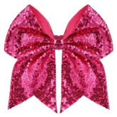 Zolyco large glitter bow clip hot pink close-up adds sparkling hair detail