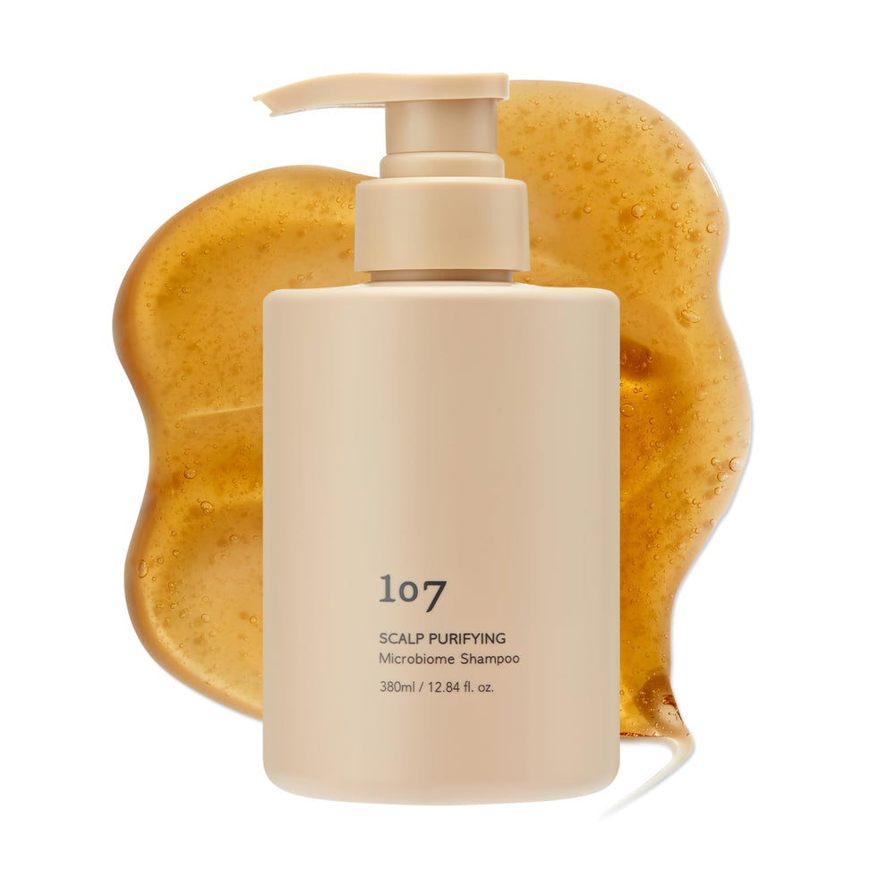 107 Clarifying Shampoo bottle pour showing a refreshed scalp effect