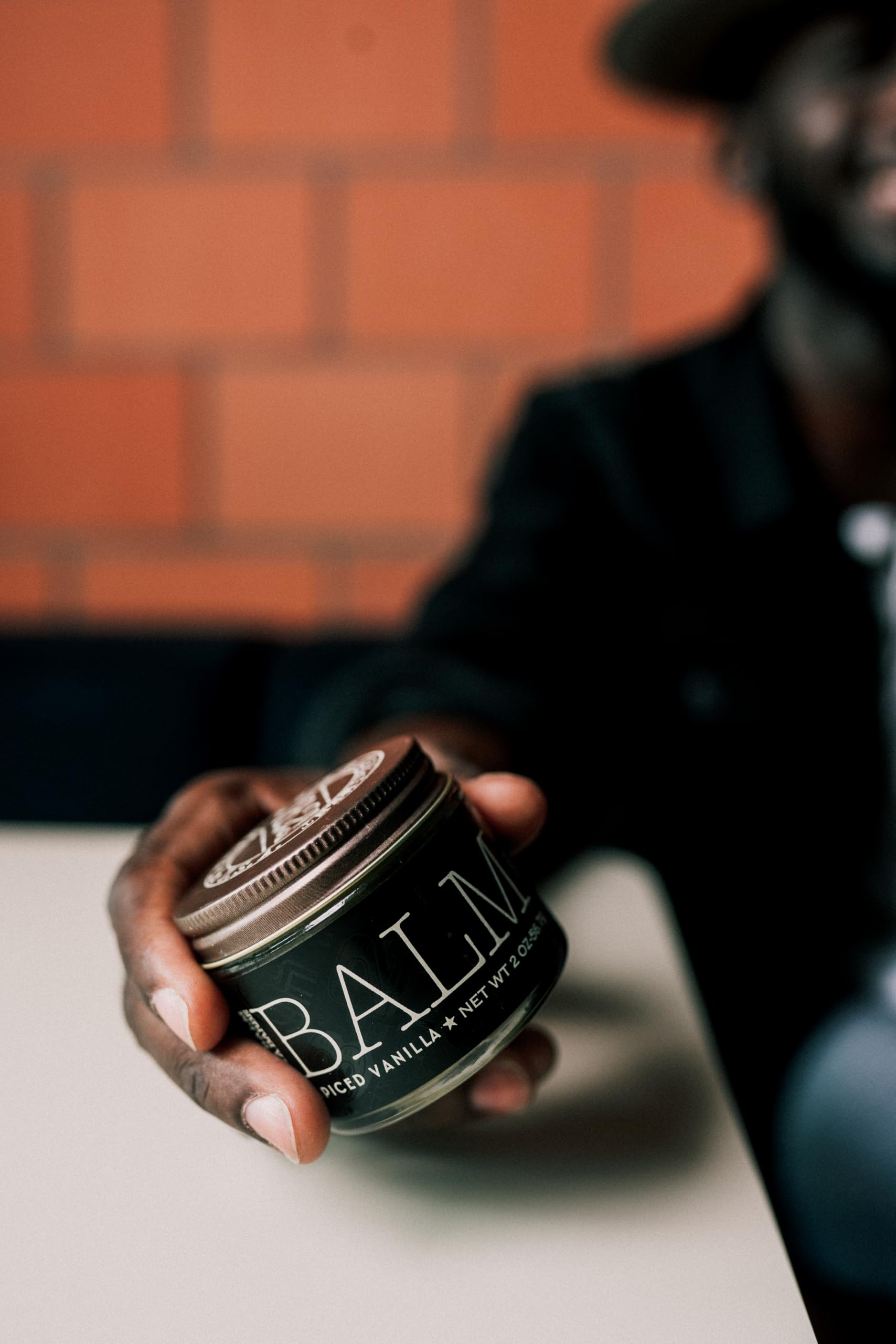 Applying 18.21 Man Made beard balm spiced vanilla to tame beard