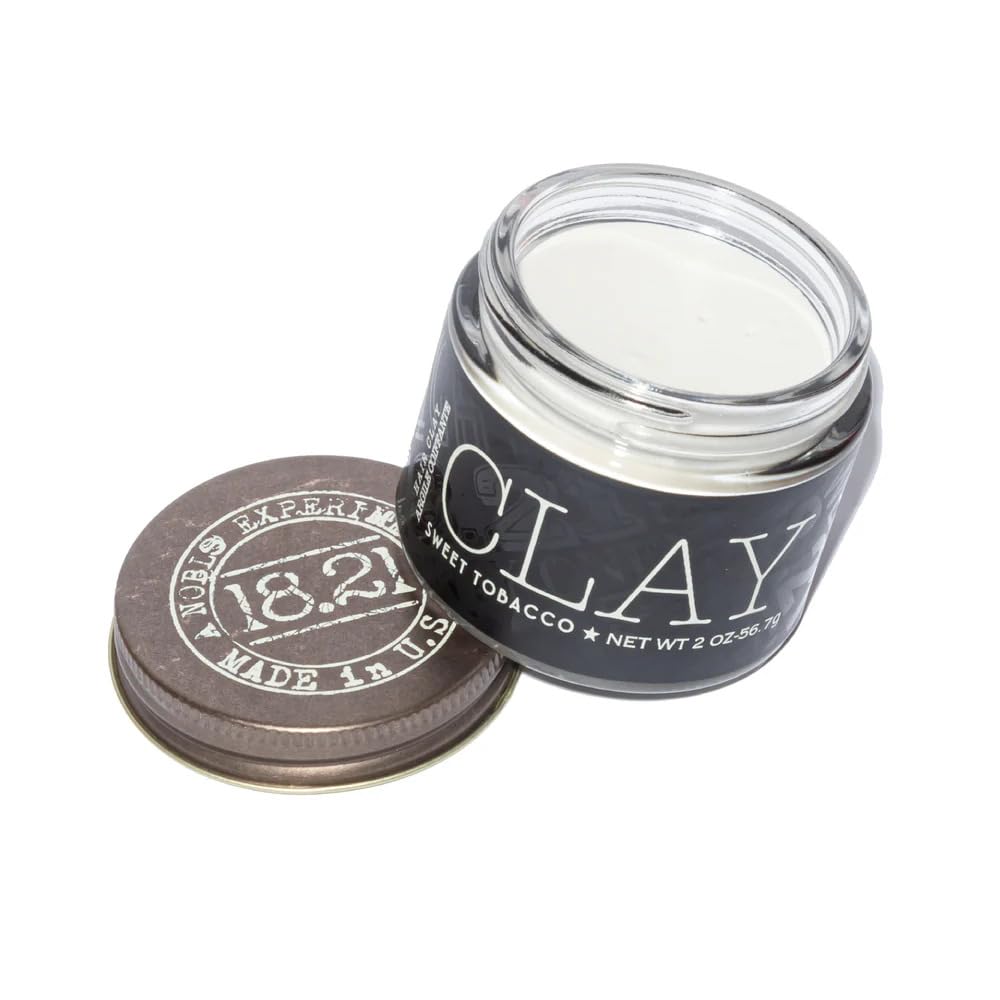 18.21 Man Made Original Sweet Tobacco hair clay bottle with matte finish.