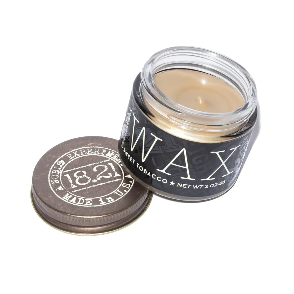 18-21 Man Made original sweet tobacco pomade bottle close-up highlighting high hold and low shine.