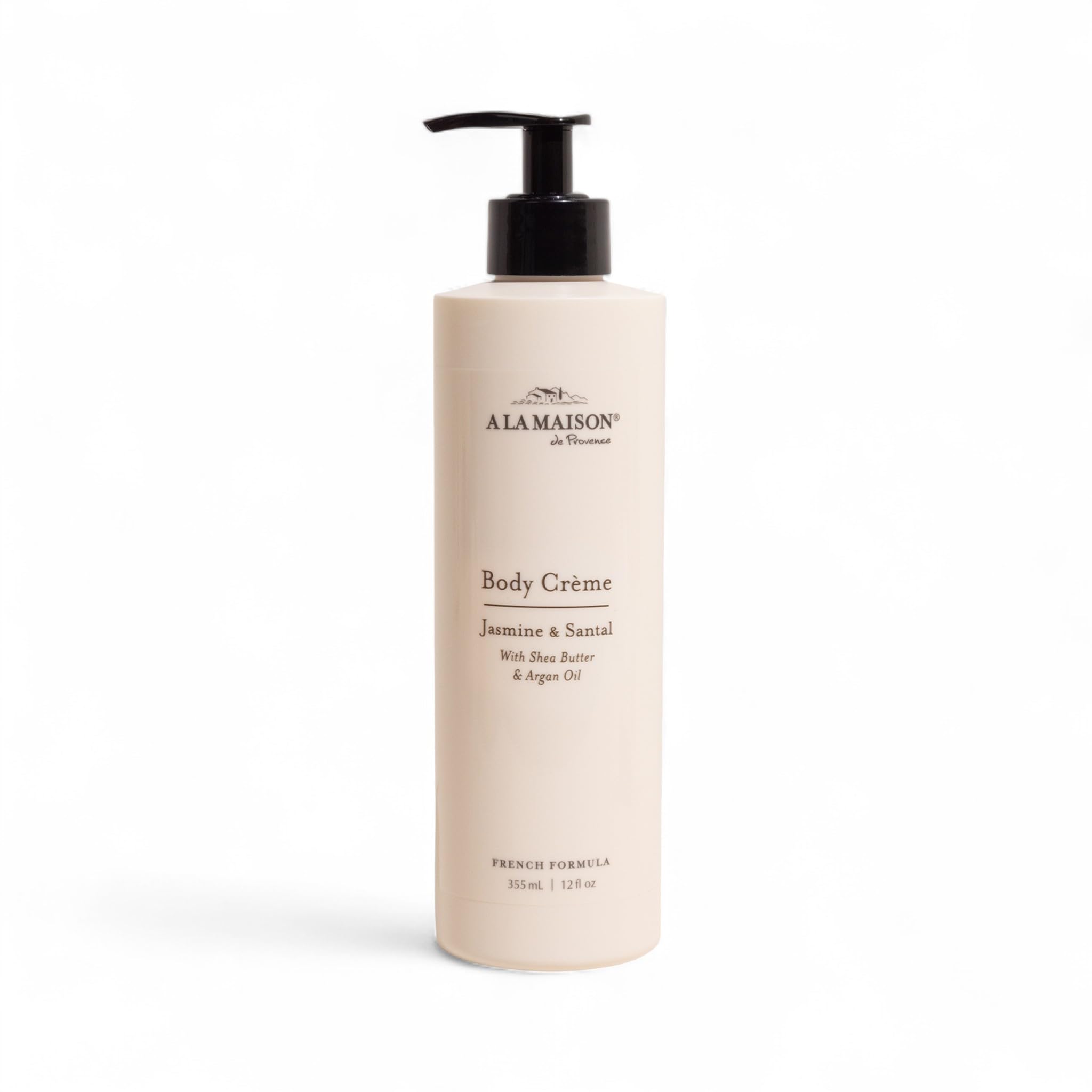 A LA MAISON Body Crème Amber bottle front, signaling rich hydration for dry skin.