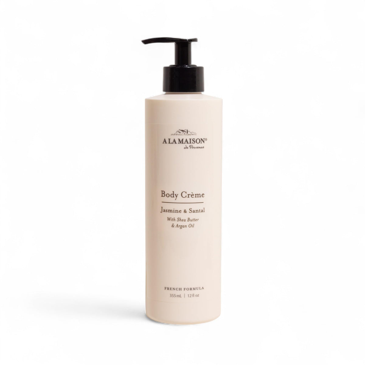 A LA MAISON Body Crème Amber bottle front, signaling rich hydration for dry skin.