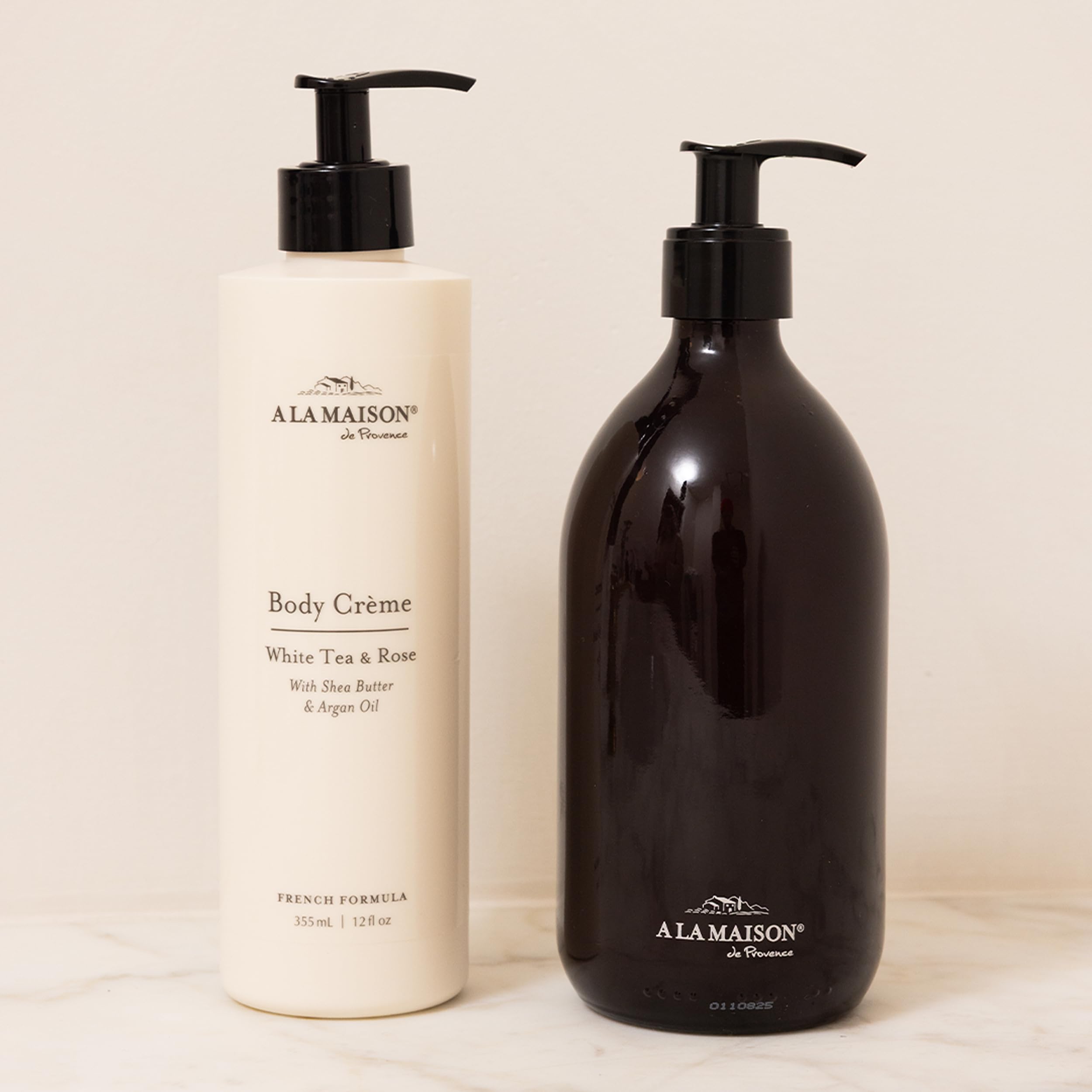 A LA MAISON Body Crème vegan and biodegradable formula inside recyclable bottle.