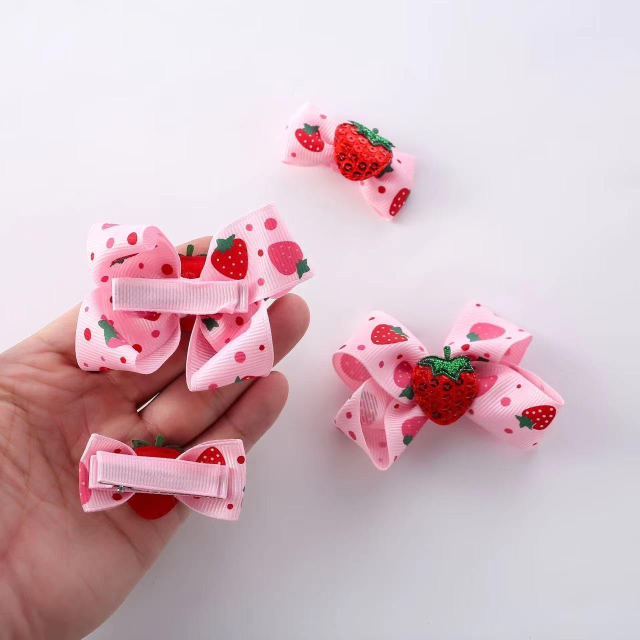 AACKS strawberry hairpin clip keeps tiny tresses secure during play.