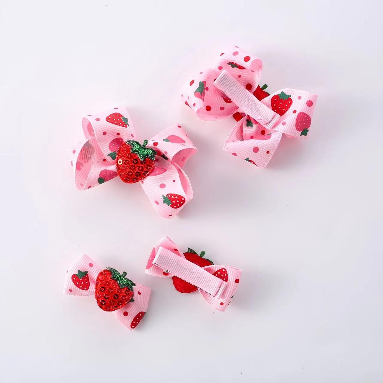 AACKS strawberry snap barrette holds hair neatly for special occasions.