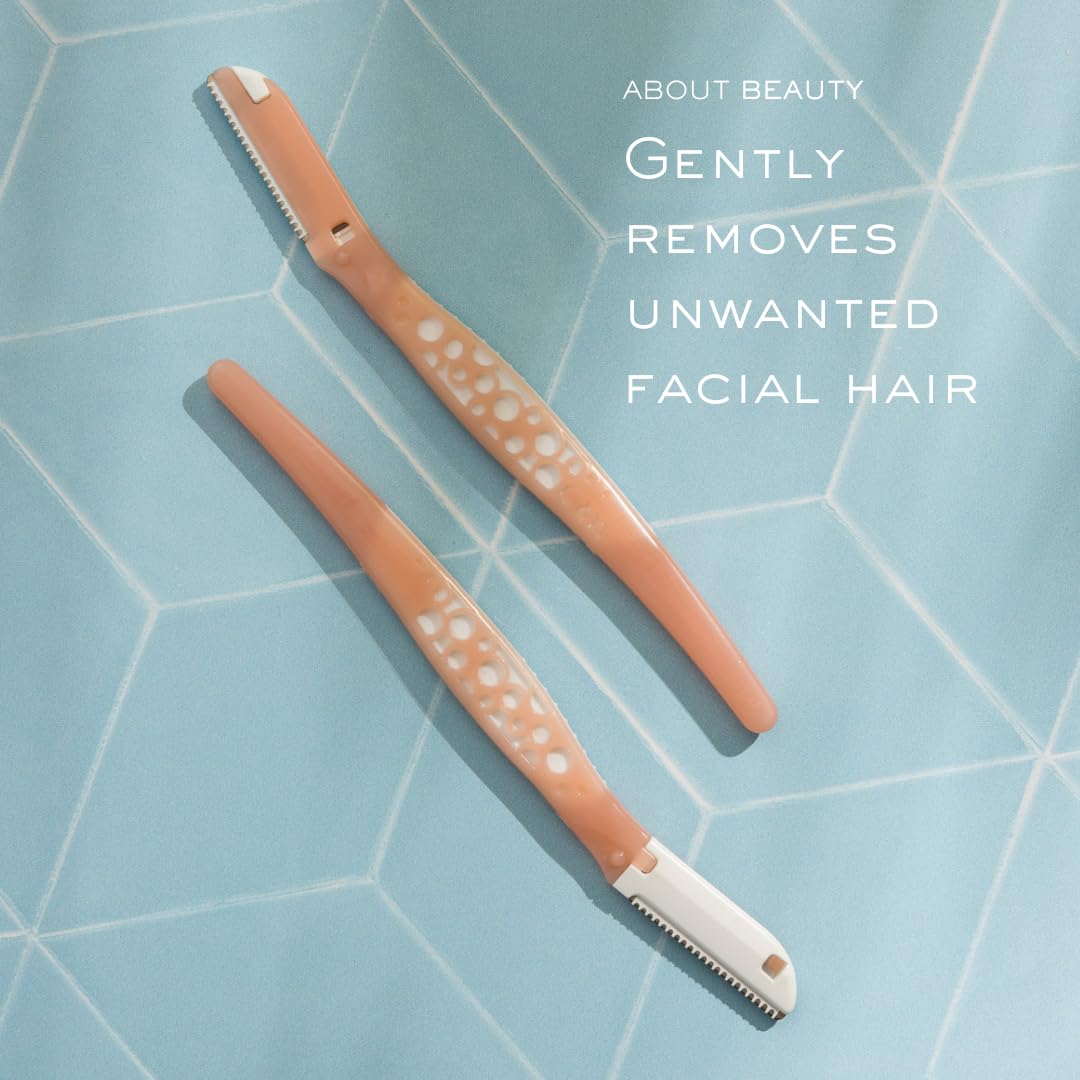 About Face Fuzz-Free Razors dermaplaning close-up for smoother skin.
