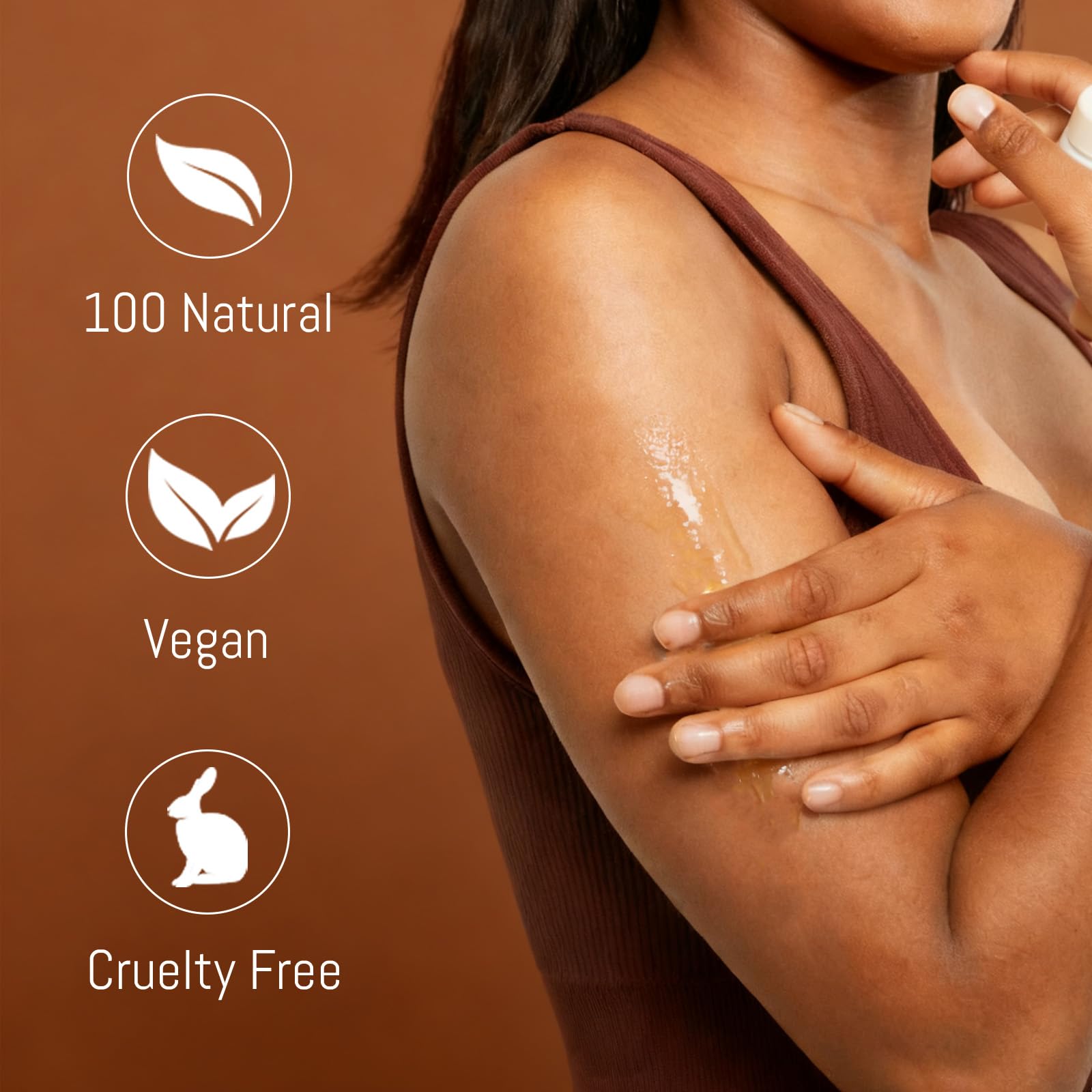 Hands apply ABYST oil, demonstrating quick absorption and silky feel.