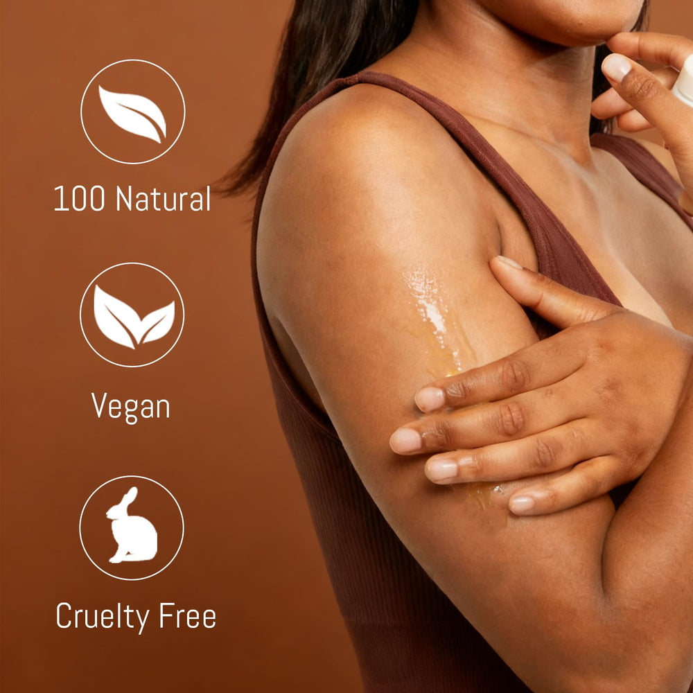 Hands apply ABYST oil, demonstrating quick absorption and silky feel.