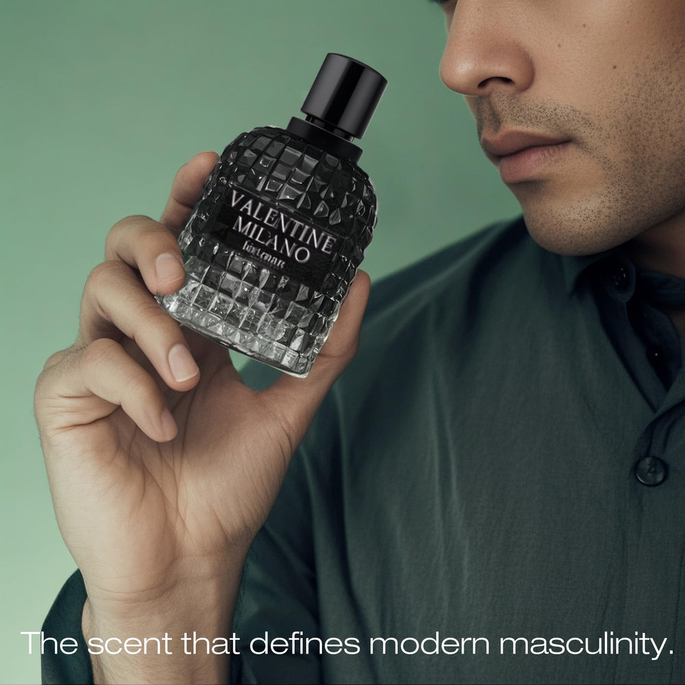 A CENTER Invincible packaging closeup, premium masculine design.