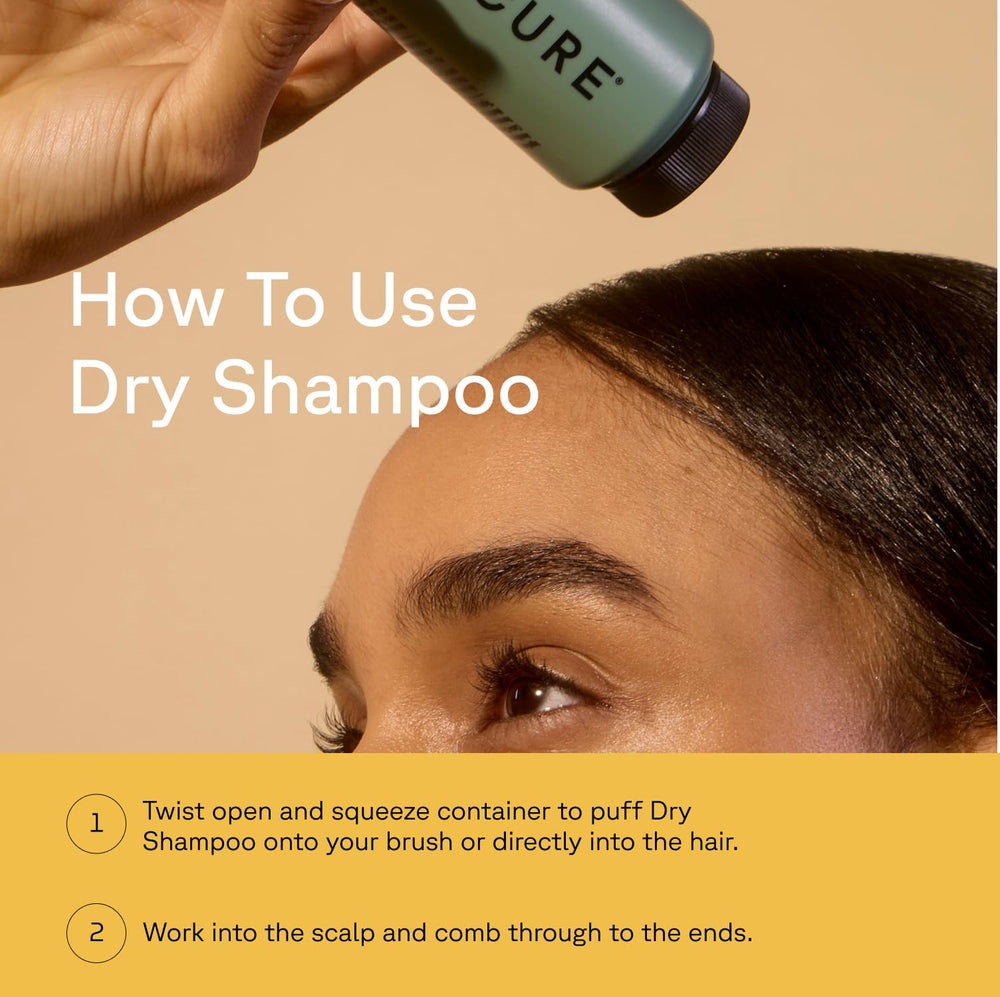 Acure Dry Shampoo con cacao y romero orgánicos con aroma natural.