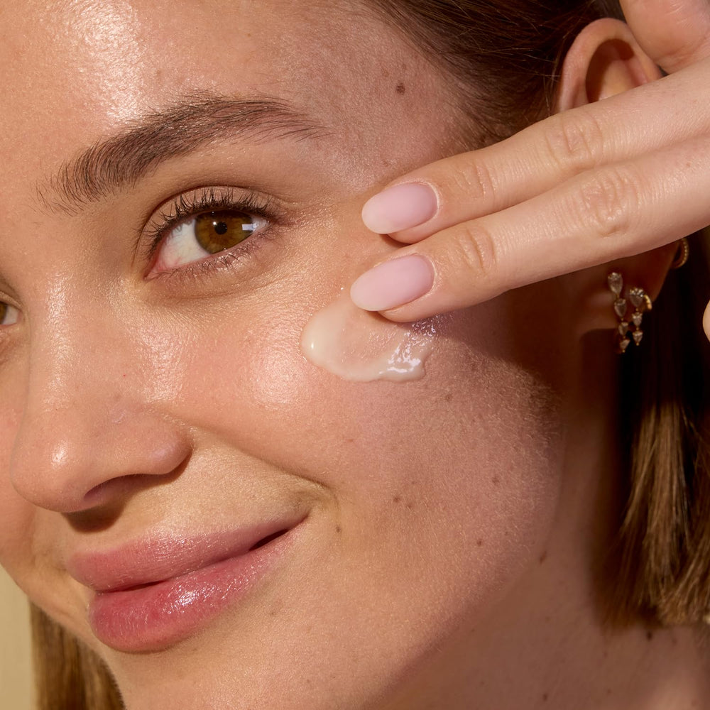 Acure Soothing Day Cream applied to the face for daily nourishment.