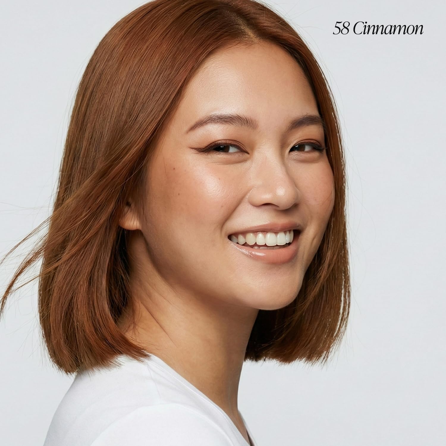 Adore Cinnamon application on hair for even, vibrant coverage.