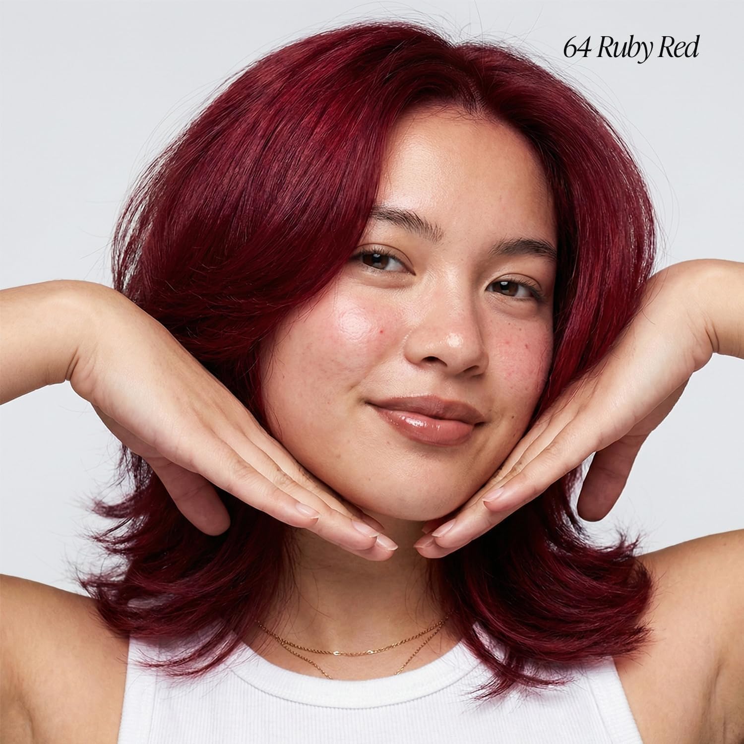 Adore Ruby Red on hair shows bold pigment with up to four weeks of wear.