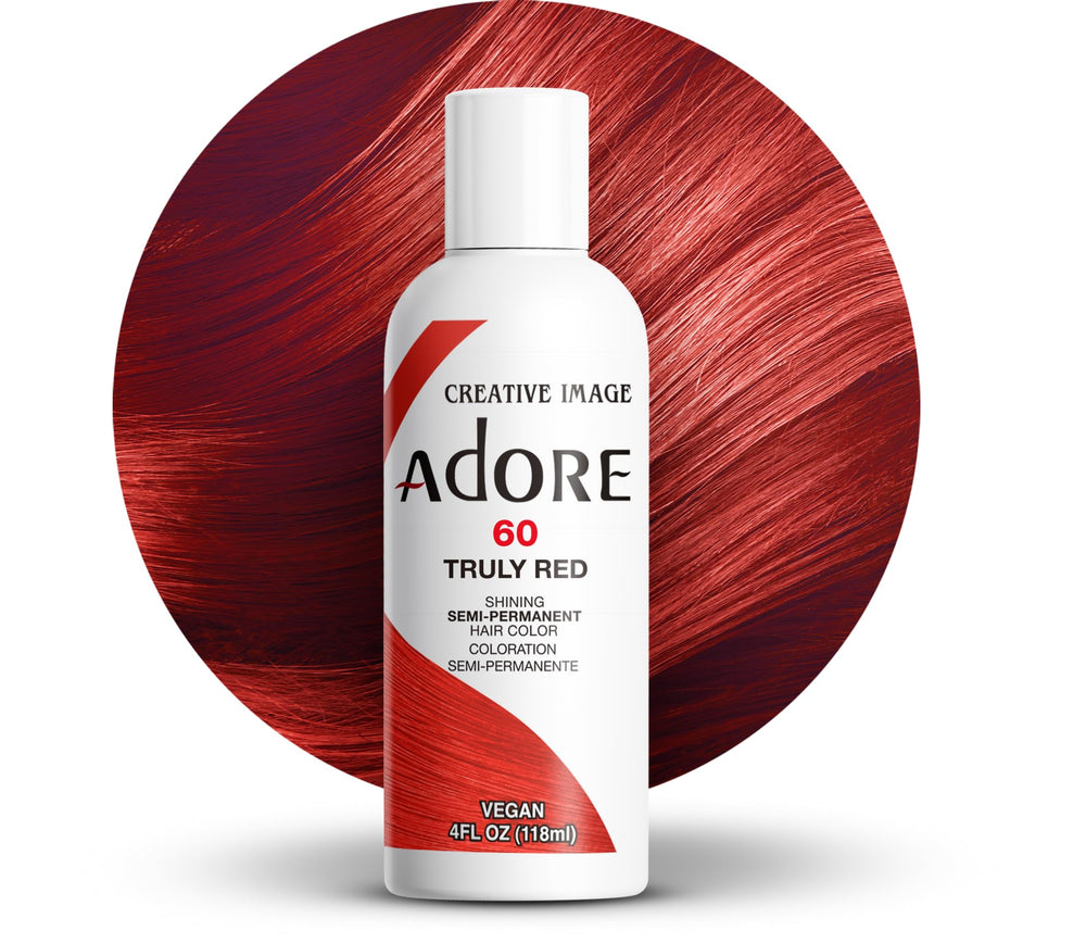 Adore Truly Red bottle pour shows bold color from vegan formula.
