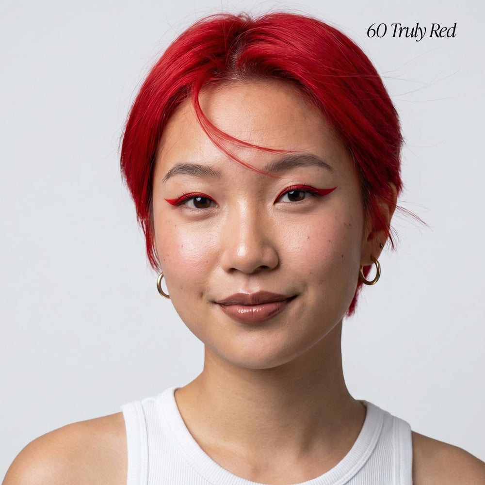 Adore Truly Red color texture closeup highlights rich pigment for at-home results.