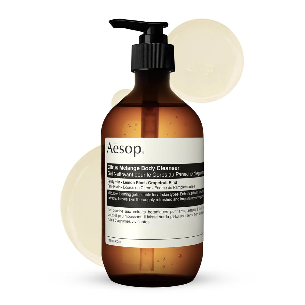 Aesop Citrus Melange bottle being poured for a refreshing lather.