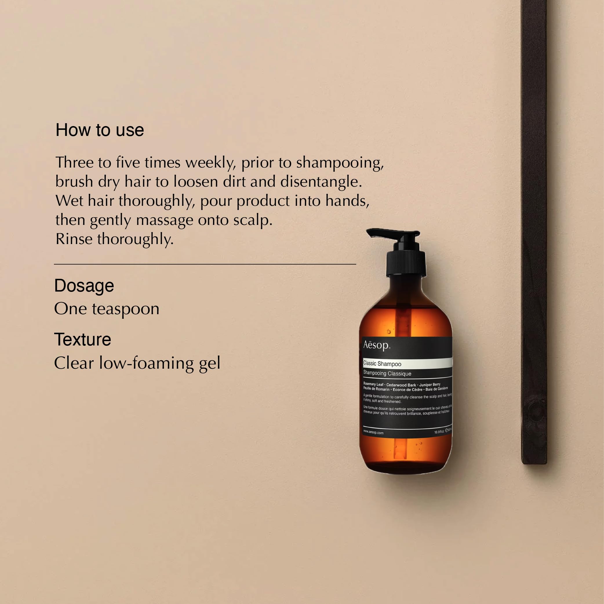 Aesop Classic Shampoo label detail highlighting rosemary, cedarwood, and juniper blend for gentle cleansing.
