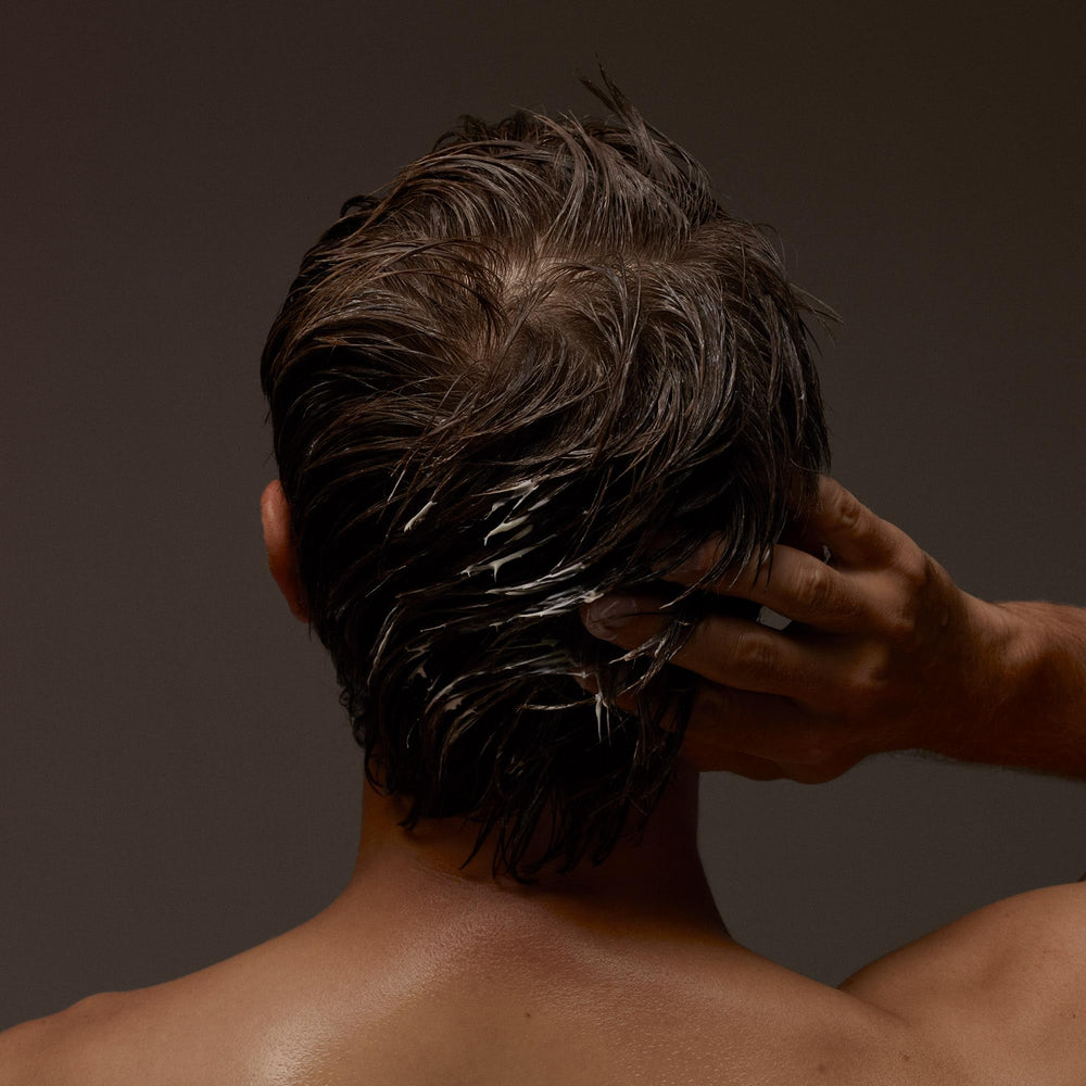 Aesop conditioner creaminess closeup emphasizes rich texture and hydration.