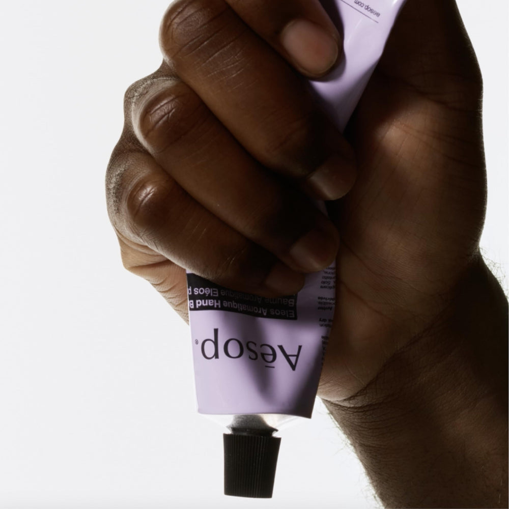 Aesop Eleos aroma profile with herbaceous, woody, and spicy notes.